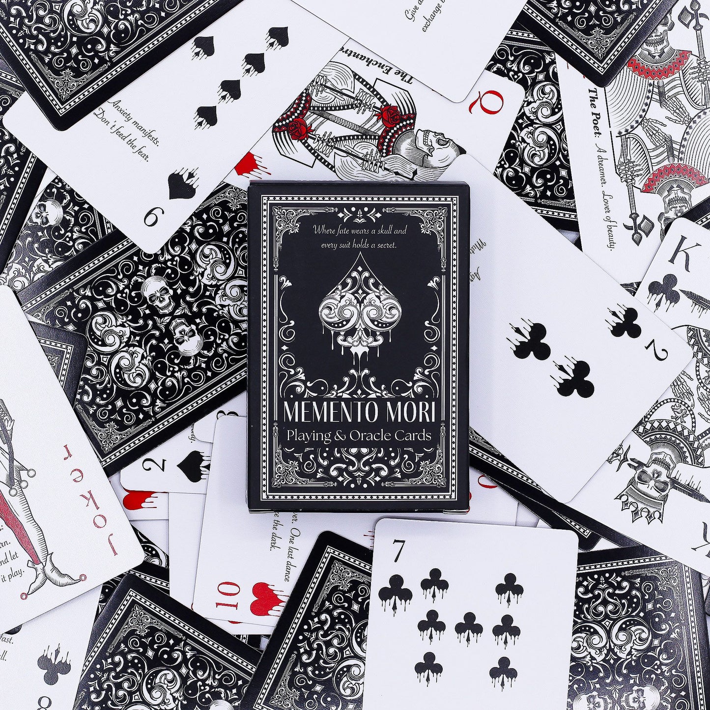 Darkly elegant Gothic playing cards featuring detailed skeletal figures and symbolic artwork on a black background.