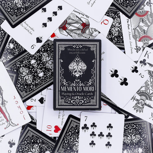 Darkly elegant Gothic playing cards featuring detailed skeletal figures and symbolic artwork on a black background.