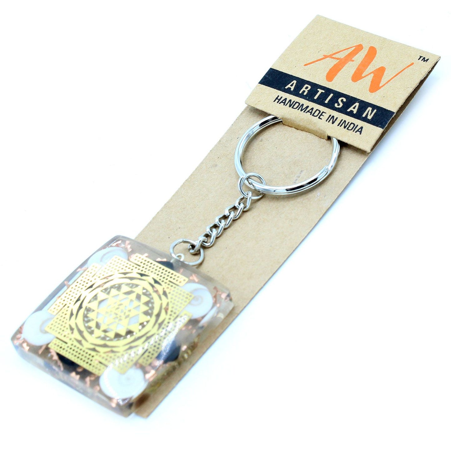 Handcrafted orgonite keyring featuring black tourmaline chips, copper shavings, and resin in a portable protective design.