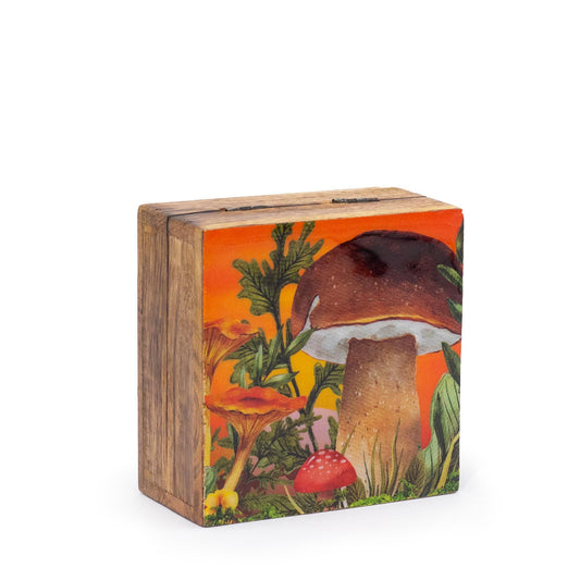 Small square maroon enameled trinket box with a white and red mushroom design on the lid.