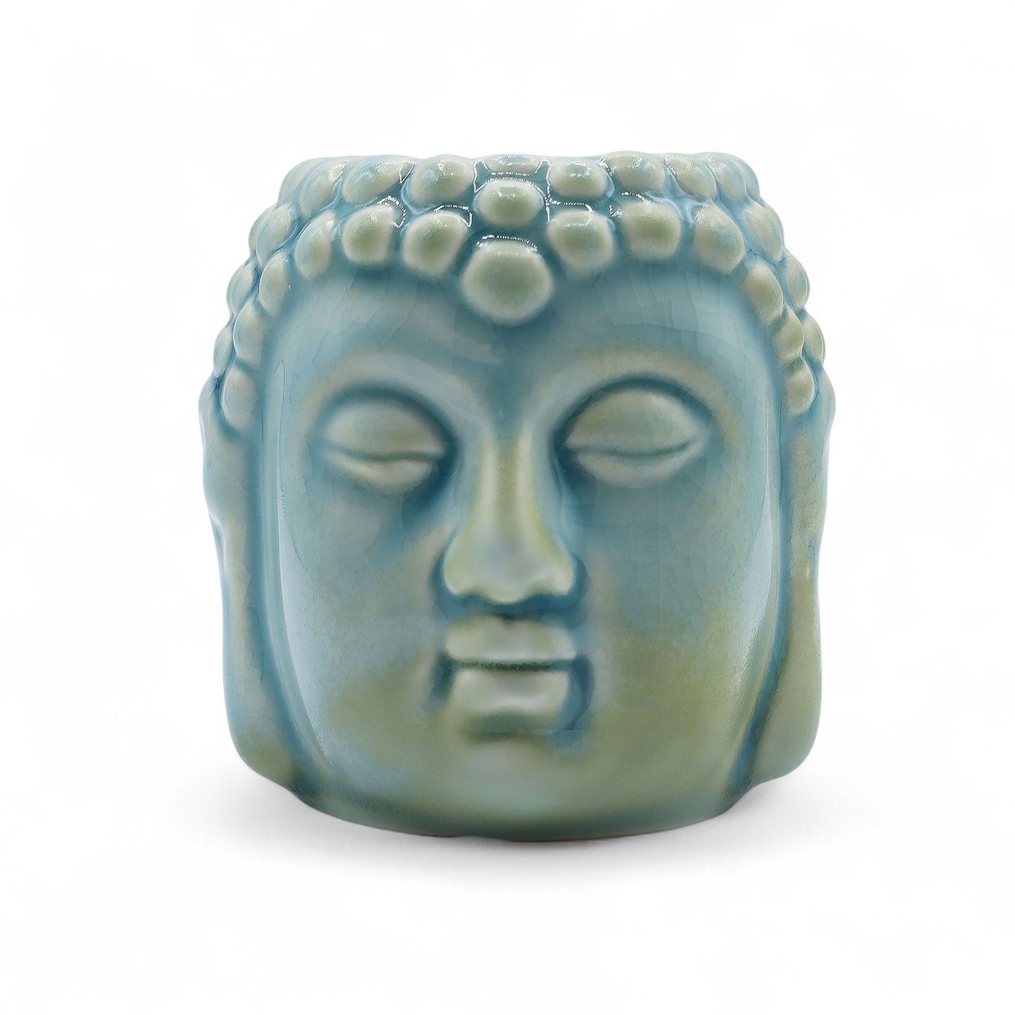 Serene blue ceramic Buddha head oil burner with a decorative glazed finish and tea light candle slot.