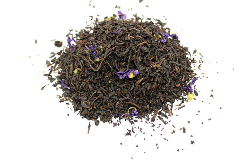 Large 1kg bag of premium loose leaf black tea with vibrant purple mauve petals and traditional bergamot fragrance.