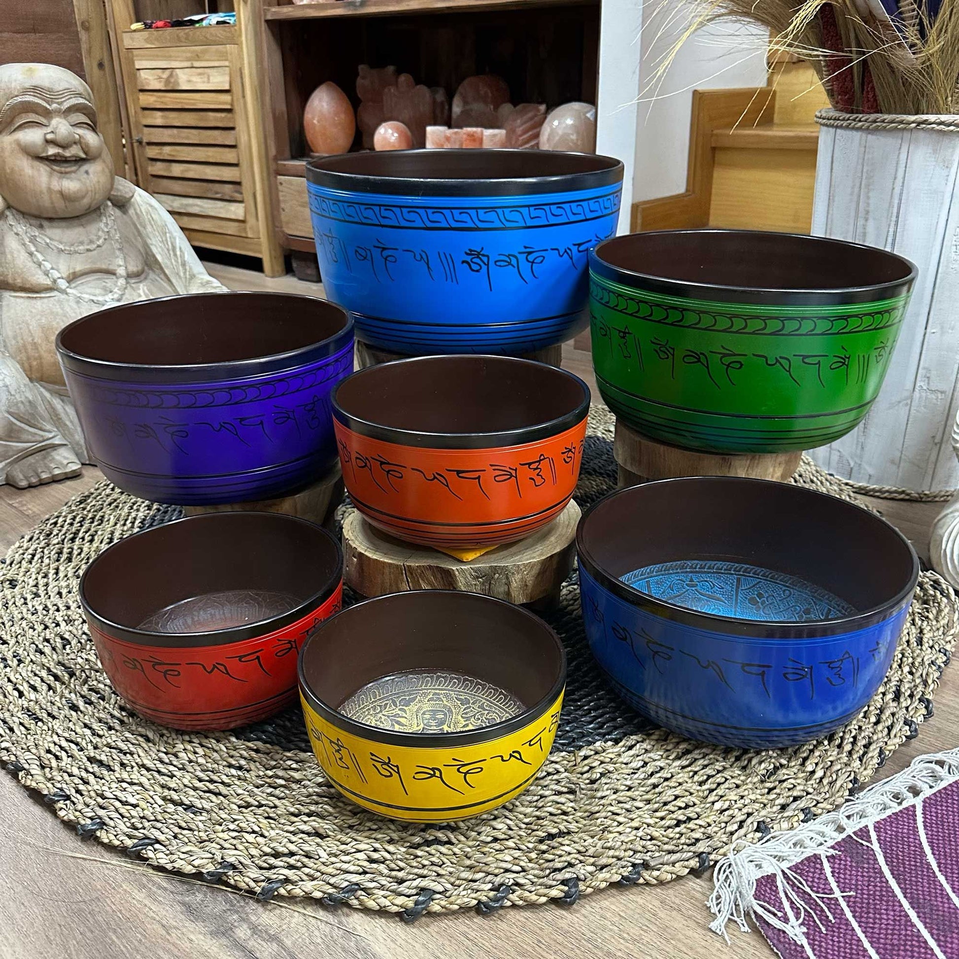 Set of seven handcrafted metal Tibetan singing bowls in graduated sizes from 19.5cm to 35cm.