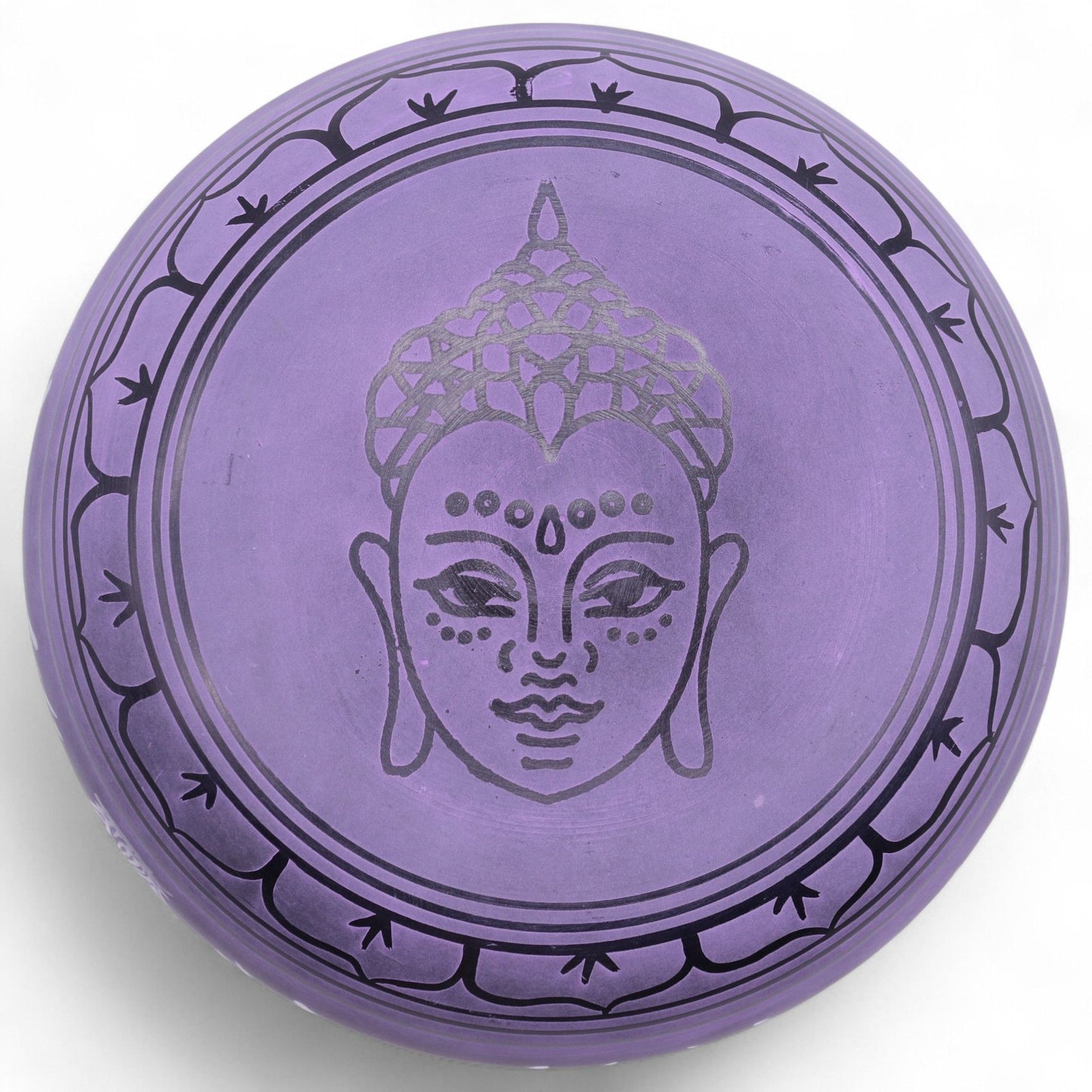 Striking purple brass mushroom-shaped singing bowl for meditation and sound therapy.