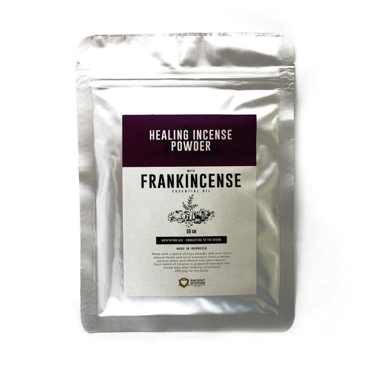 Enchanting frankincense healing incense powder in a small heap ready for burning on a heat-resistant holder.