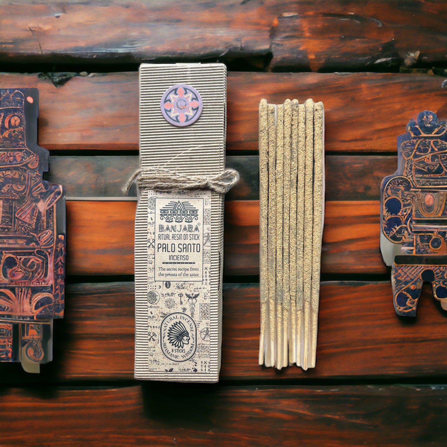Handcrafted ritual resin incense stick featuring natural Palo Santo on a slender wooden base.