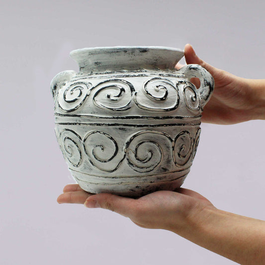 Handcrafted 15cm cream clay plant pot with two small decorative handles and a smooth matte finish.