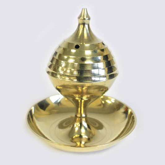 Handcrafted polished brass incense burner with a dome-shaped perforated lid for sticks and cones.