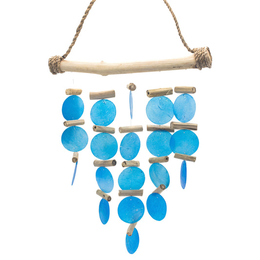 Handcrafted wind chime made from natural driftwood pieces and blue circular Capiz shells hanging on delicate strings.