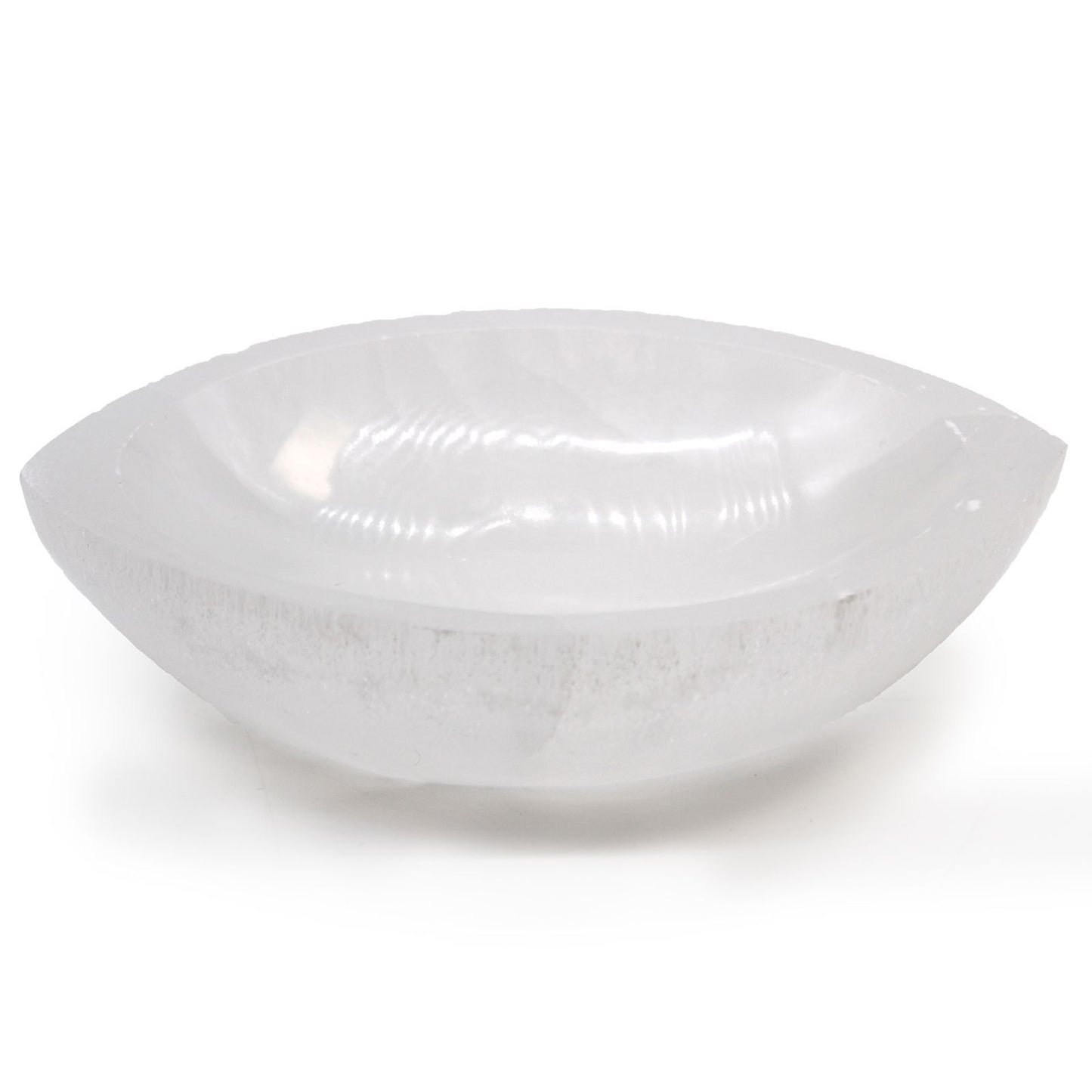 Large carved selenite bowl in a unique eye shape with a smooth, translucent white finish.