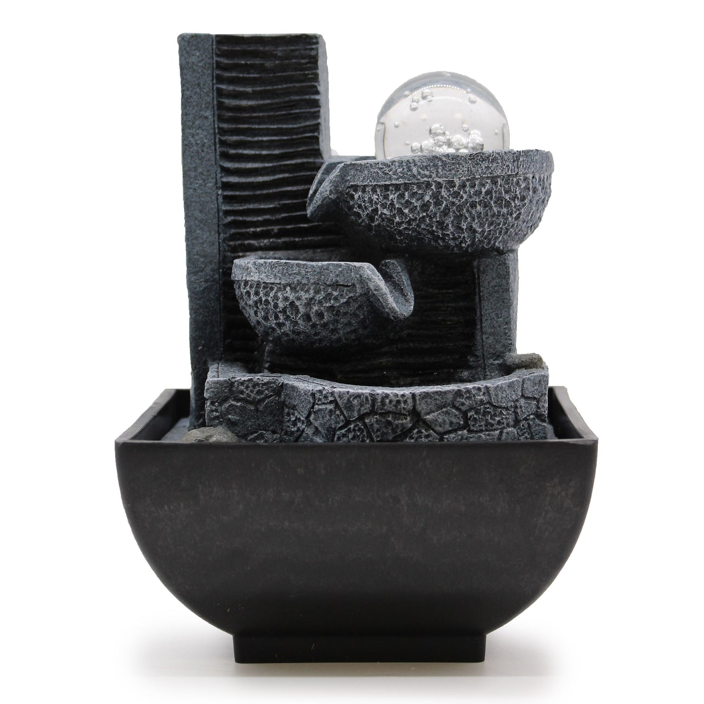 Small indoor tabletop water feature with three grey stone-effect pots pouring water into a circular basin.