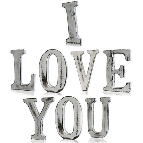 Handmade white-wash mango wood letters spelling out I LOVE YOU in a rustic shabby chic style.