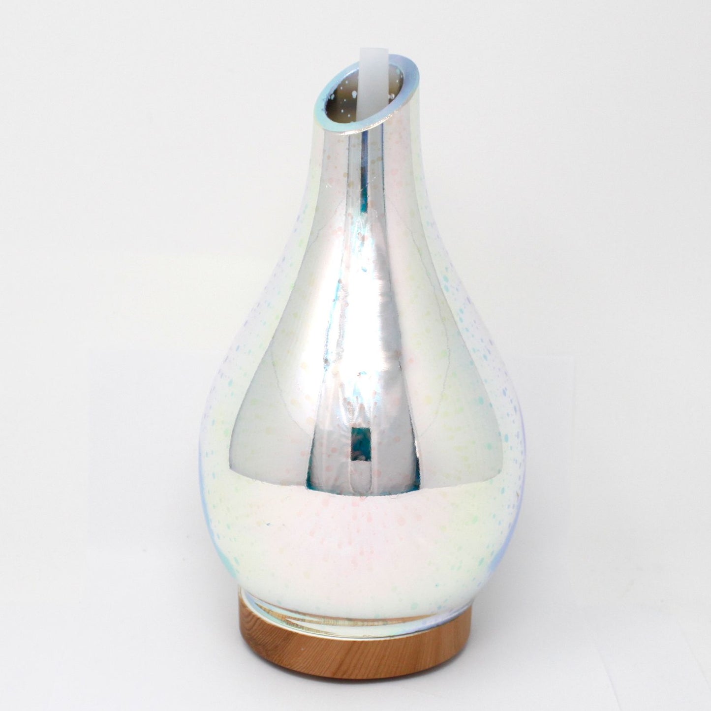 Tall cylindrical white aroma atomiser with a 3D infinity light effect and a cool fragrant mist rising from the top.