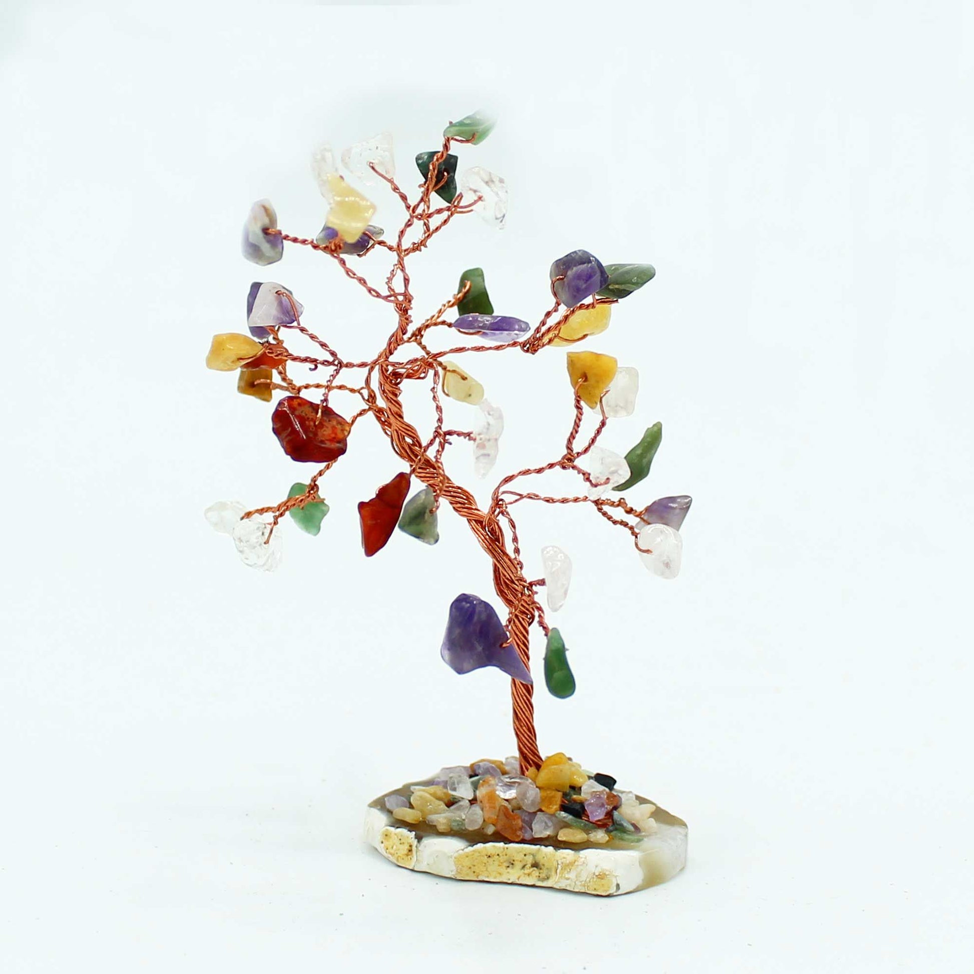 Handcrafted gemstone tree with colourful crystal leaves on a polished natural agate base.