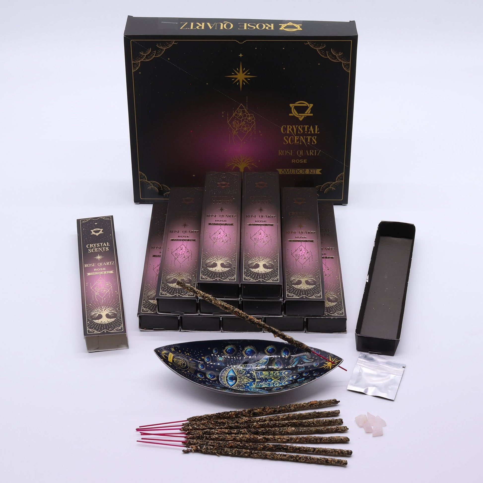 Handcrafted rose scented smudge incense sticks displayed with natural pink rose quartz chipstones.