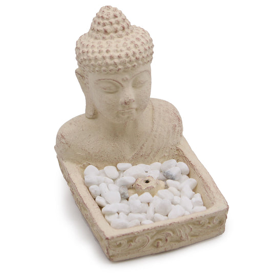 Serene cream-coloured Buddha head incense burner crafted from stone for a minimalist spiritual home aesthetic.