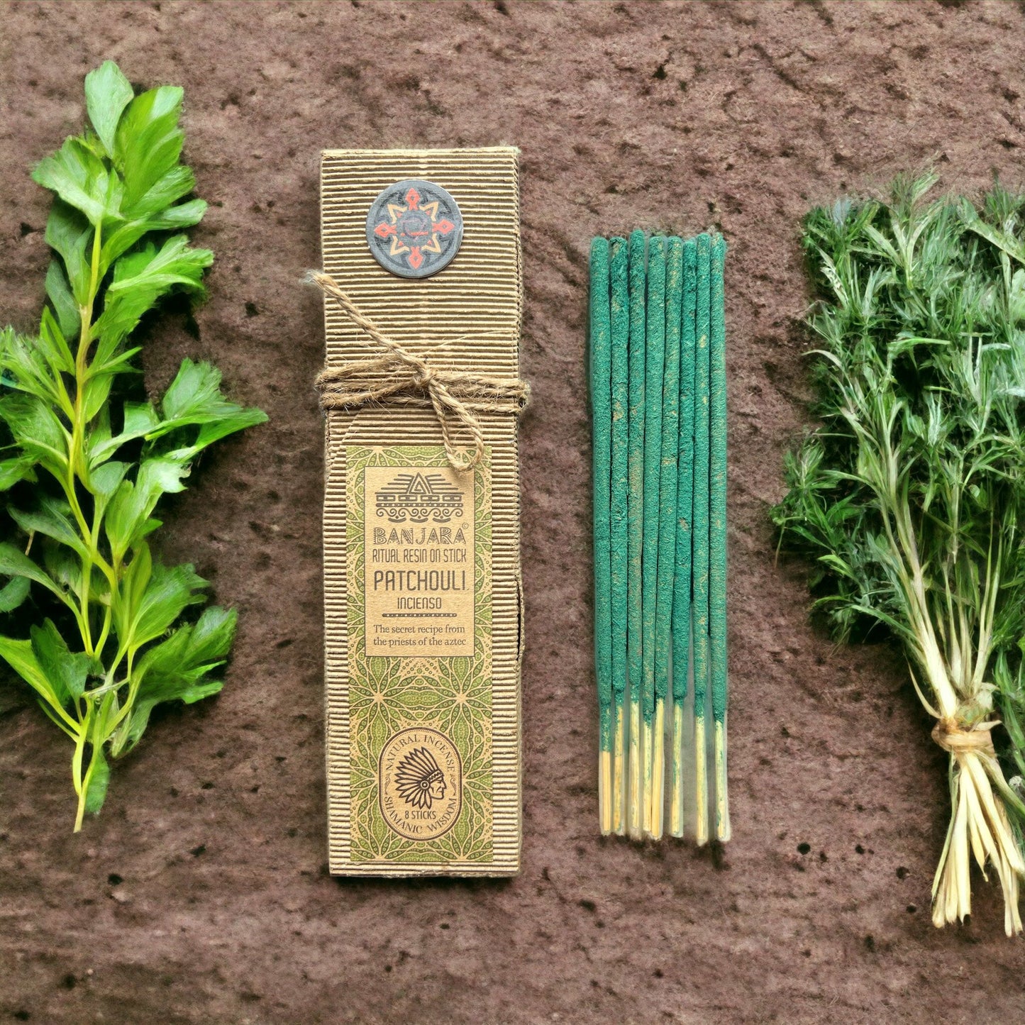 Handcrafted ritual resin stick with an earthy patchouli fragrance resting on a neutral background.