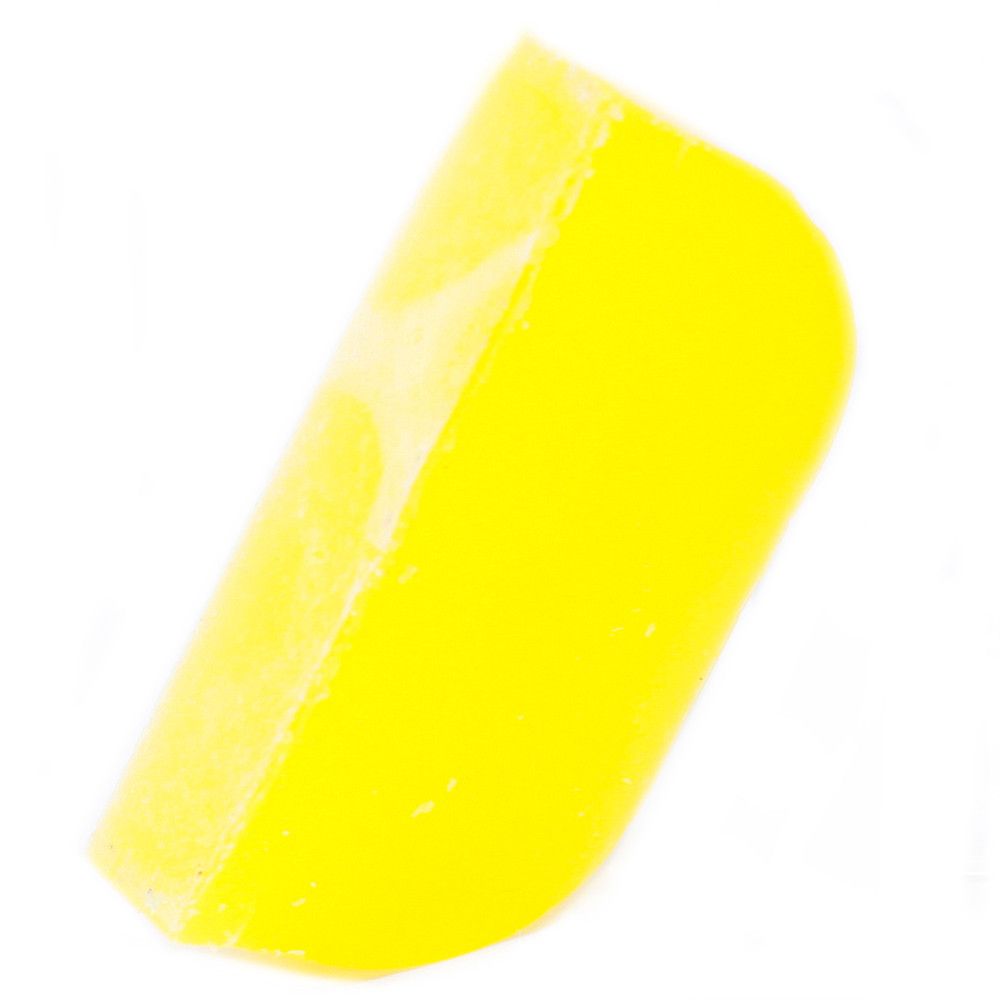 Vibrant yellow and white handcrafted solid shampoo bar with a textured surface, enriched with argan oil and chamomile.