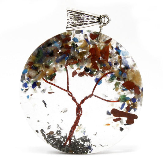 Round orgonite pendant featuring amethyst gemstone chips and a copper tree of life symbol encased in resin.