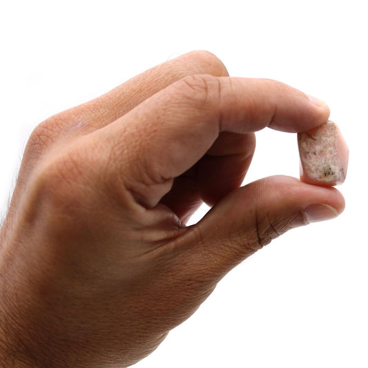 Smooth, polished medium-sized Peruvian Opal tumble stone with a soft, milky appearance and natural markings.