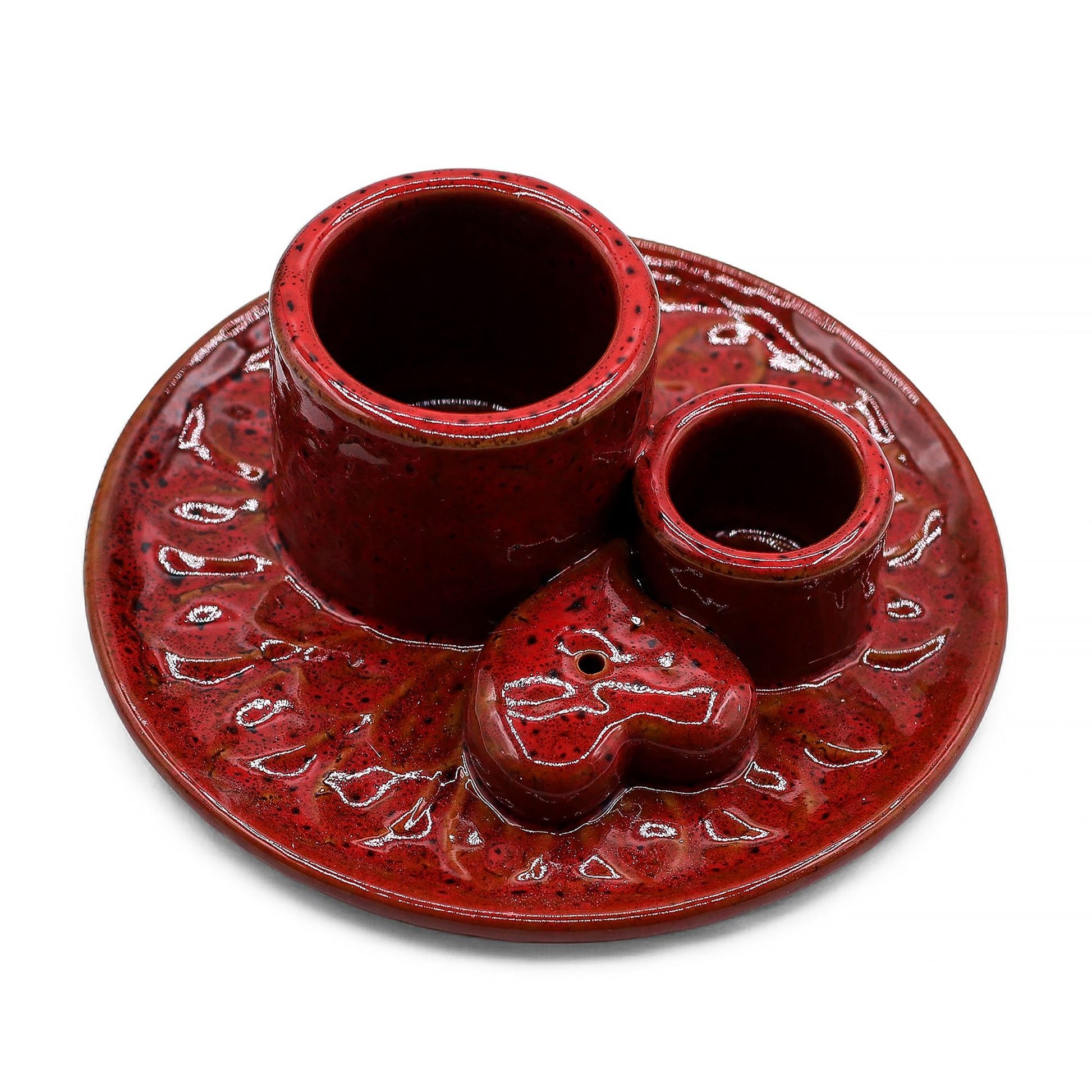Glossy red ceramic Palo Santo and smudge stick holder with an intricate white mandala and heart design.