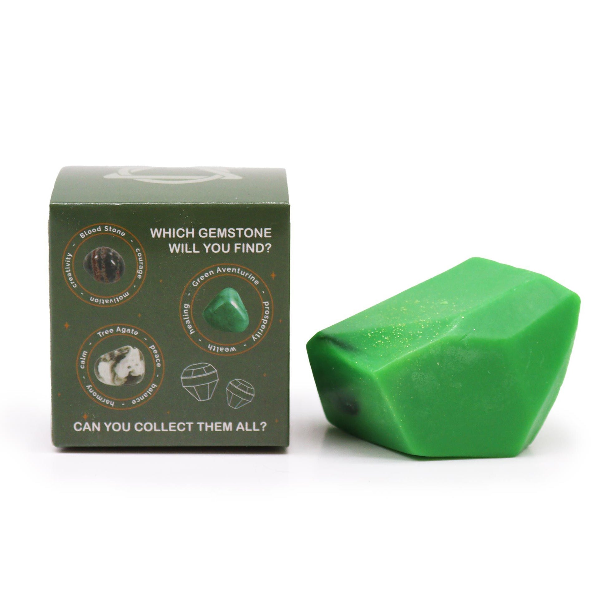 Luxurious stone-shaped handcrafted soap with an earthy texture, presented in a decorative gift box.