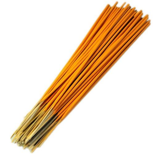 Large bundle of natural raw unfragranced incense sticks in a vibrant orange colour.