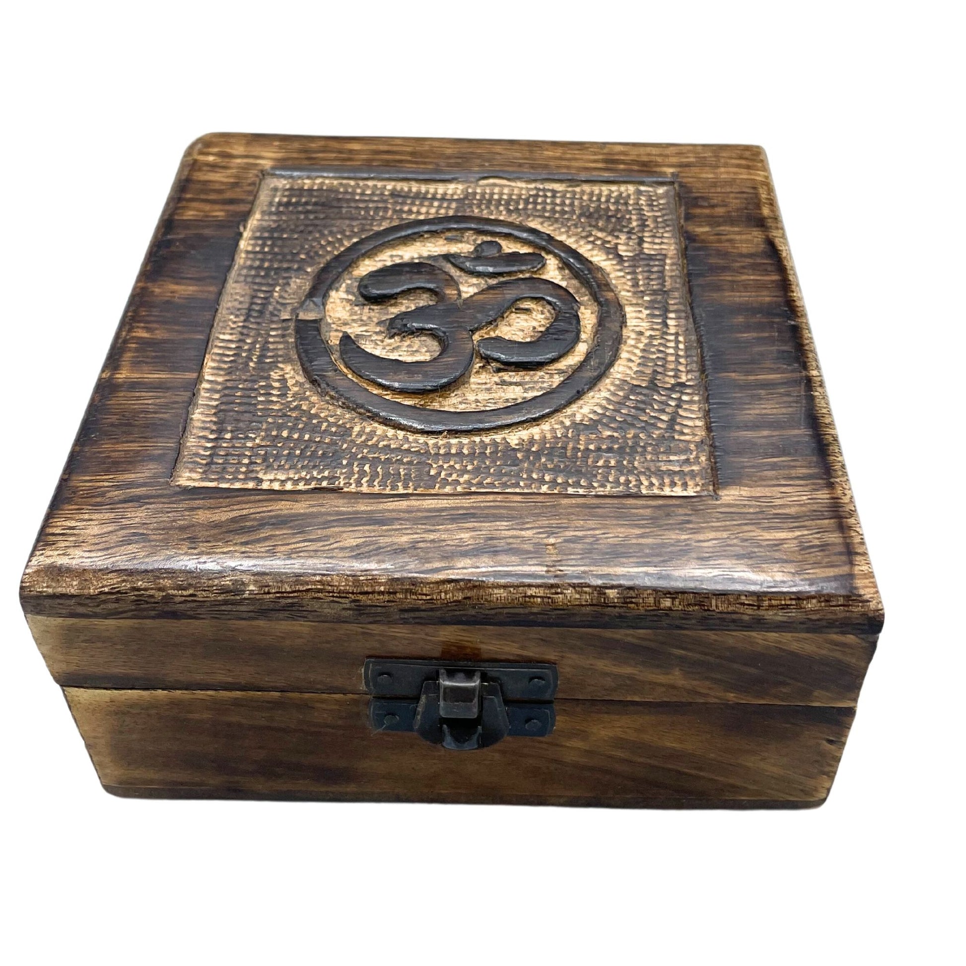 Square hand-carved wooden keepsake box featuring a central Om symbol on the lid with decorative floral carvings.