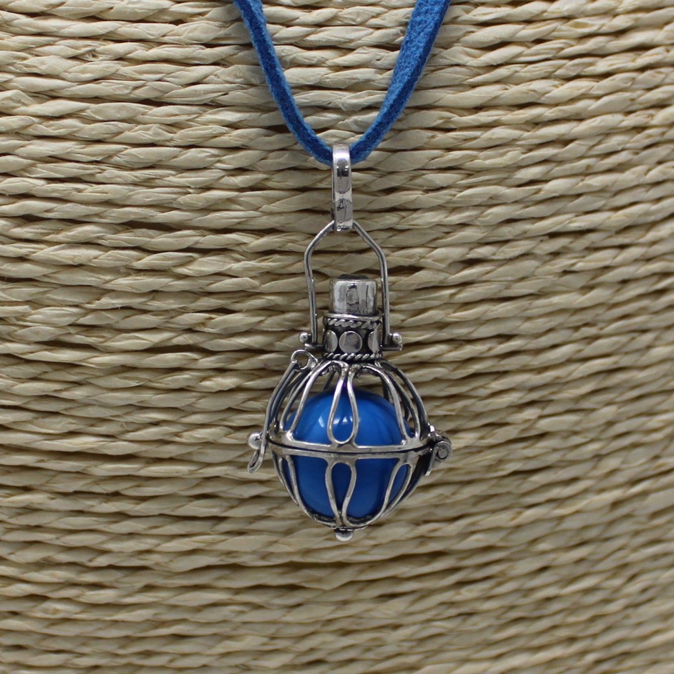 Delicate 16mm 925 sterling silver angel bell pendant with intricate traditional Balinese metalwork details.
