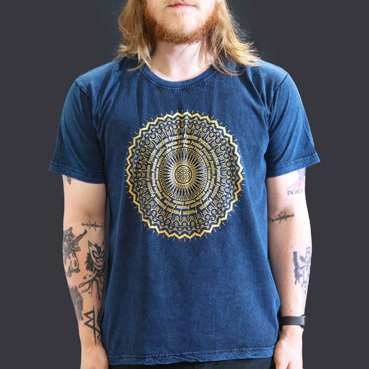 Large blue t-shirt with a stonewashed finish featuring a detailed white mandala design on the front.