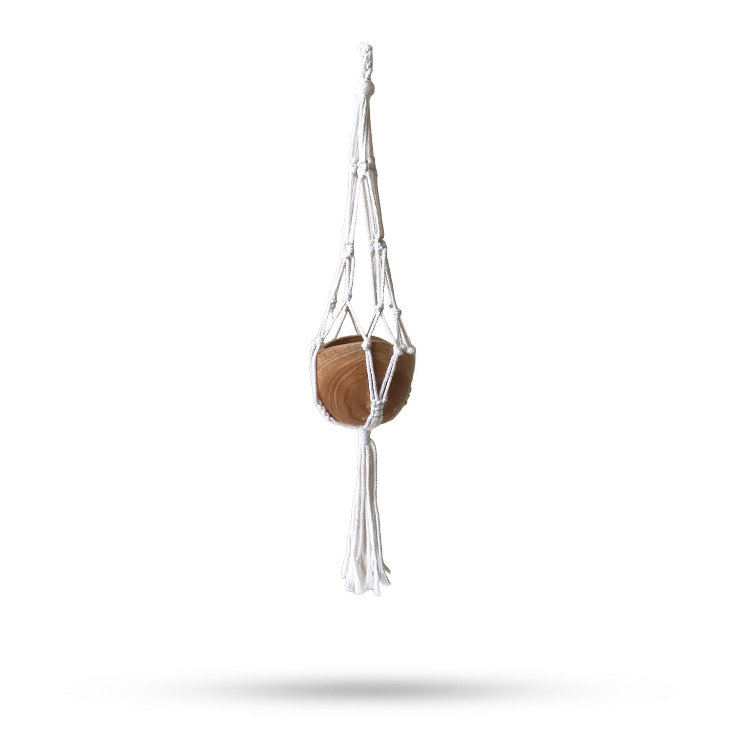 Handcrafted natural cotton macrame plant hanger featuring a classic knotted design for a large flower pot.