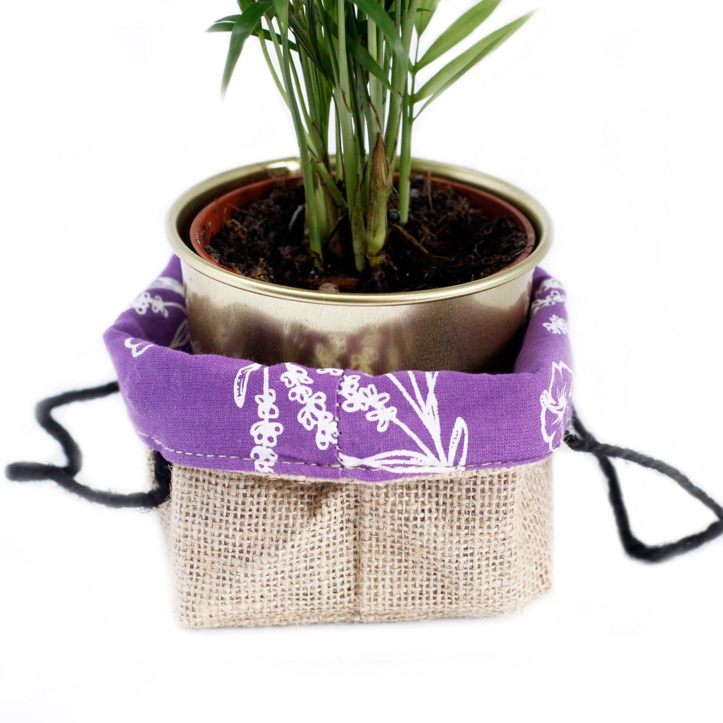 Medium eco-friendly natural jute gift bag with a soft lavender purple cotton lining and sturdy handles.