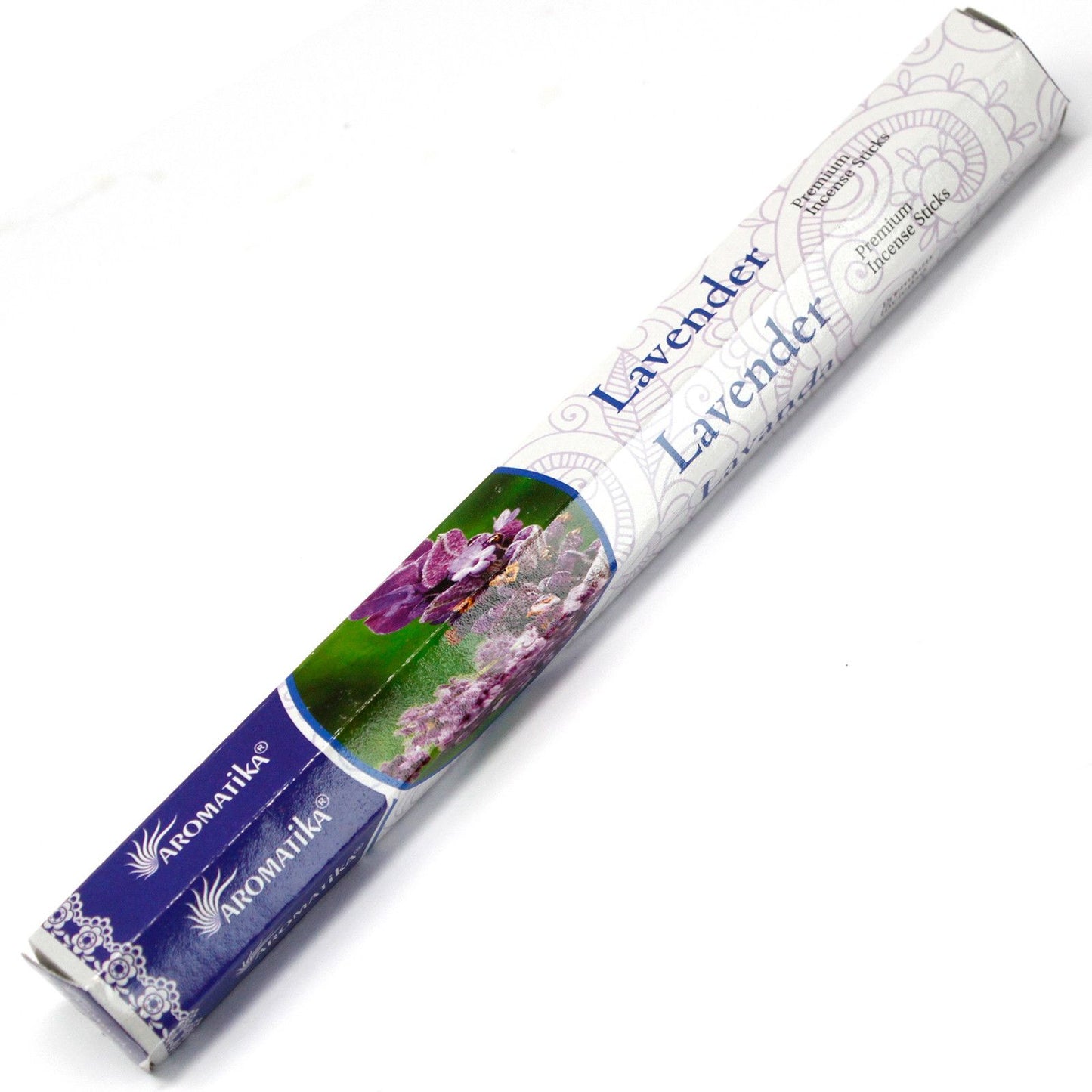 Hand-rolled natural masala incense sticks with a calming lavender fragrance on a wooden surface.