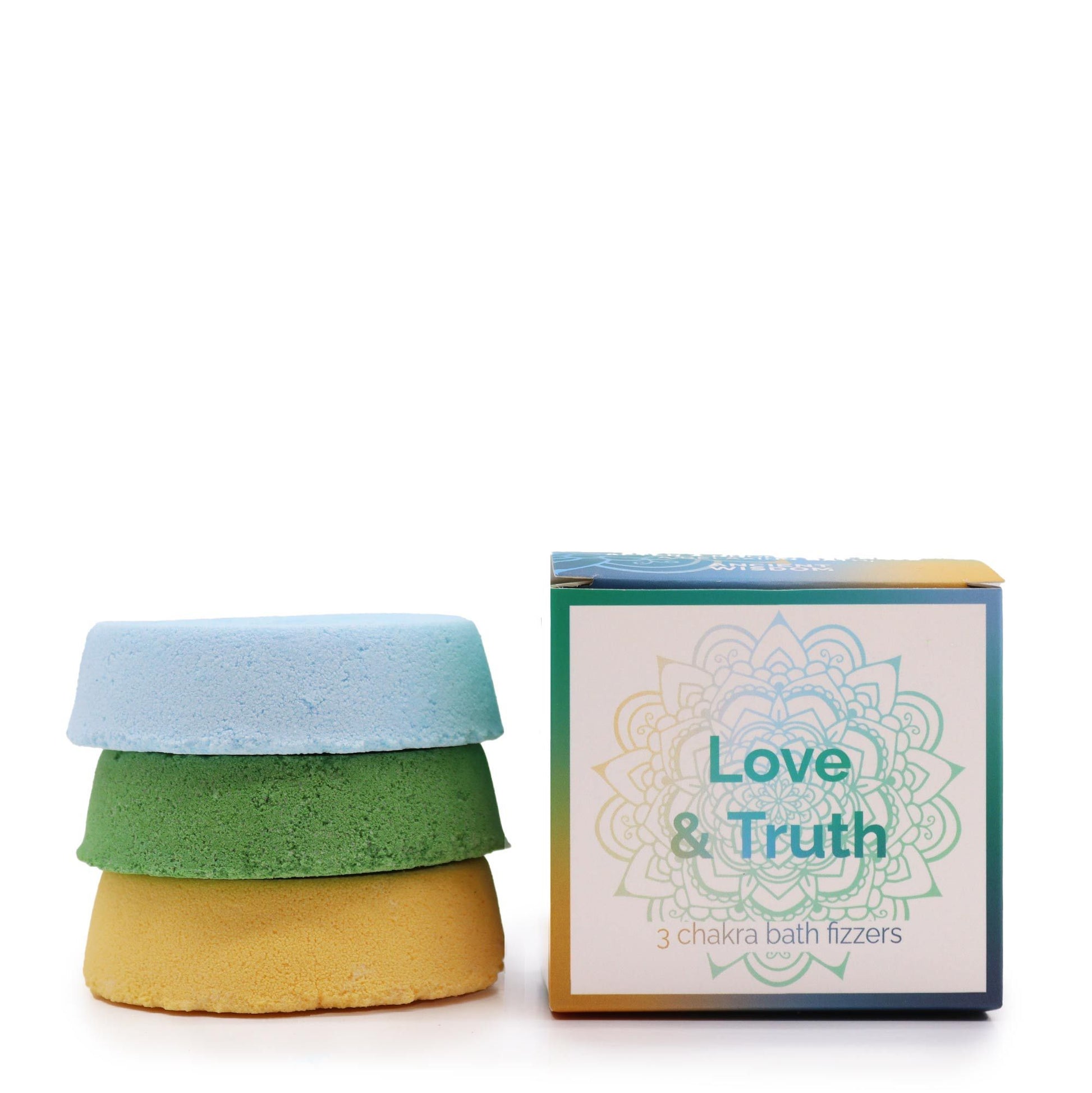 A gift box containing blue and pink chakra bath fizzers infused with essential oils for spiritual wellness.