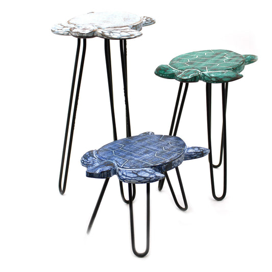 Trio of hand-carved turtle design Albasia wood plant stands with black metal hairpin legs in varying heights.
