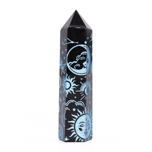 Polished black obsidian crystal point with intricate sky blue celestial patterns and a sharp tapered tip.