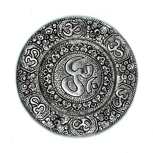 Circular polished silver aluminium incense holder featuring an engraved sacred Om symbol in the centre.