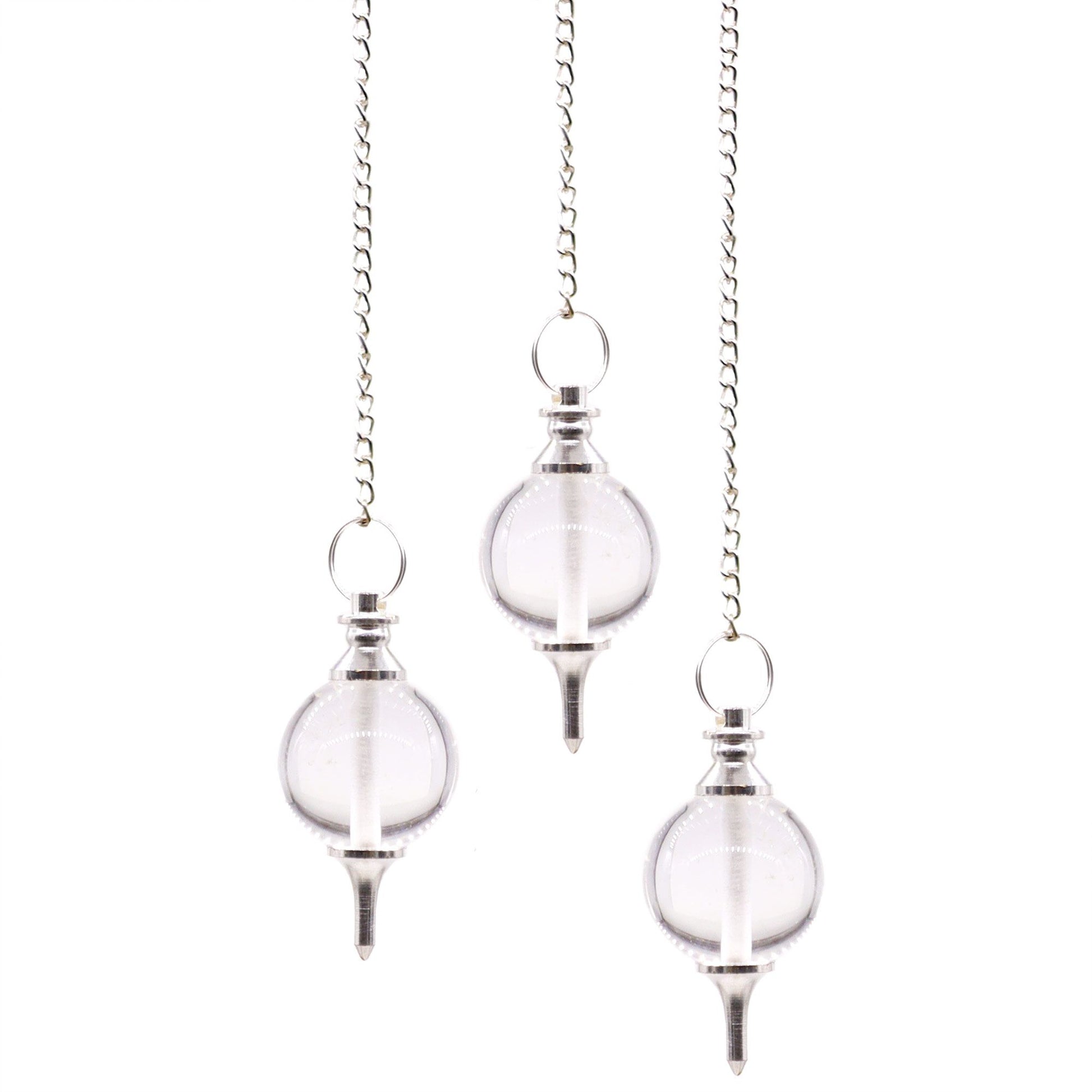 Clear rock quartz sphere pendulum attached to a silver chain with a small gemstone bead at the top.
