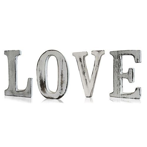 Set of four handmade white-wash mango wood letters spelling the word LOVE with a shabby chic finish.