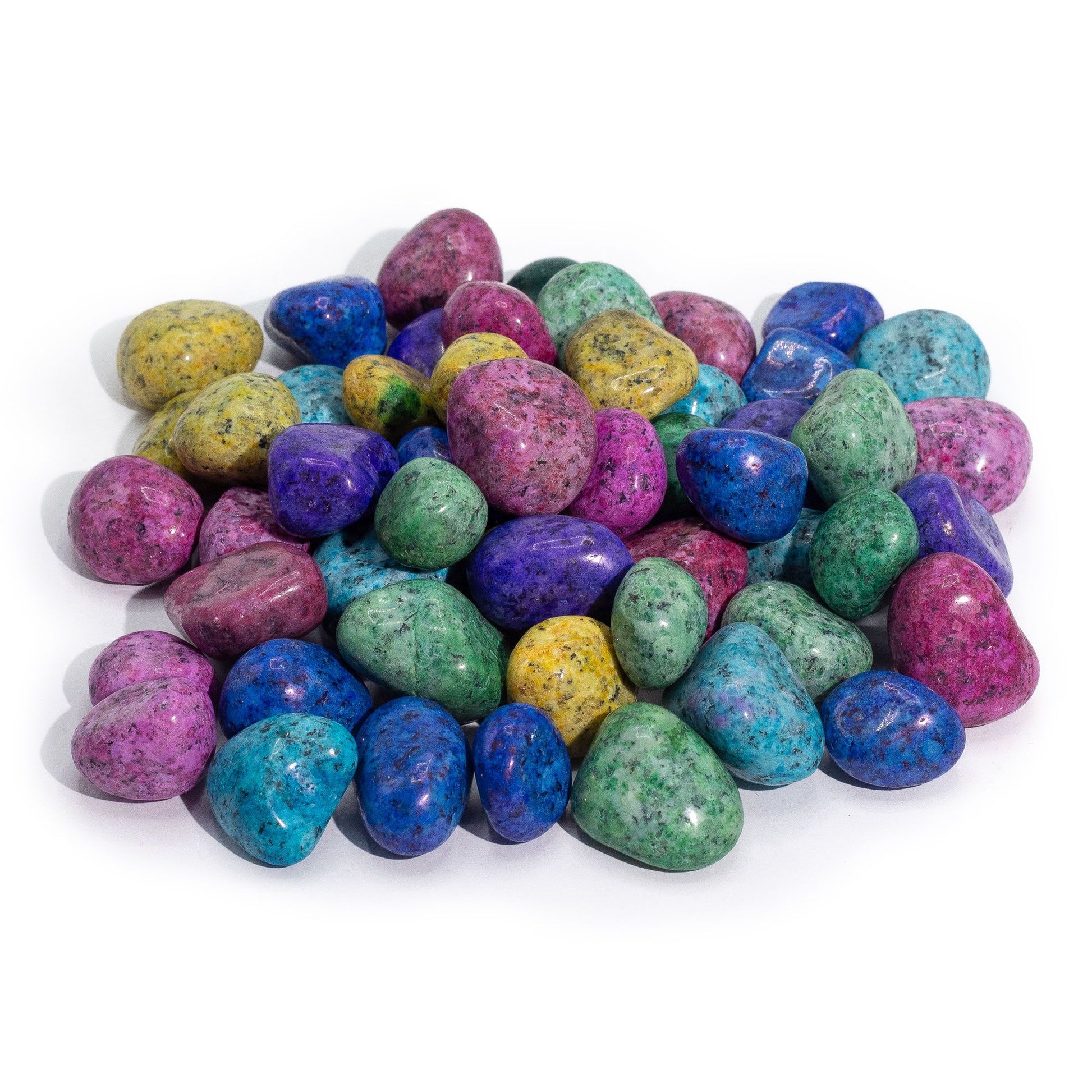 A collection of small, smooth tumbled stones with black spots, treated in bright shades of pink, blue, purple, and green.