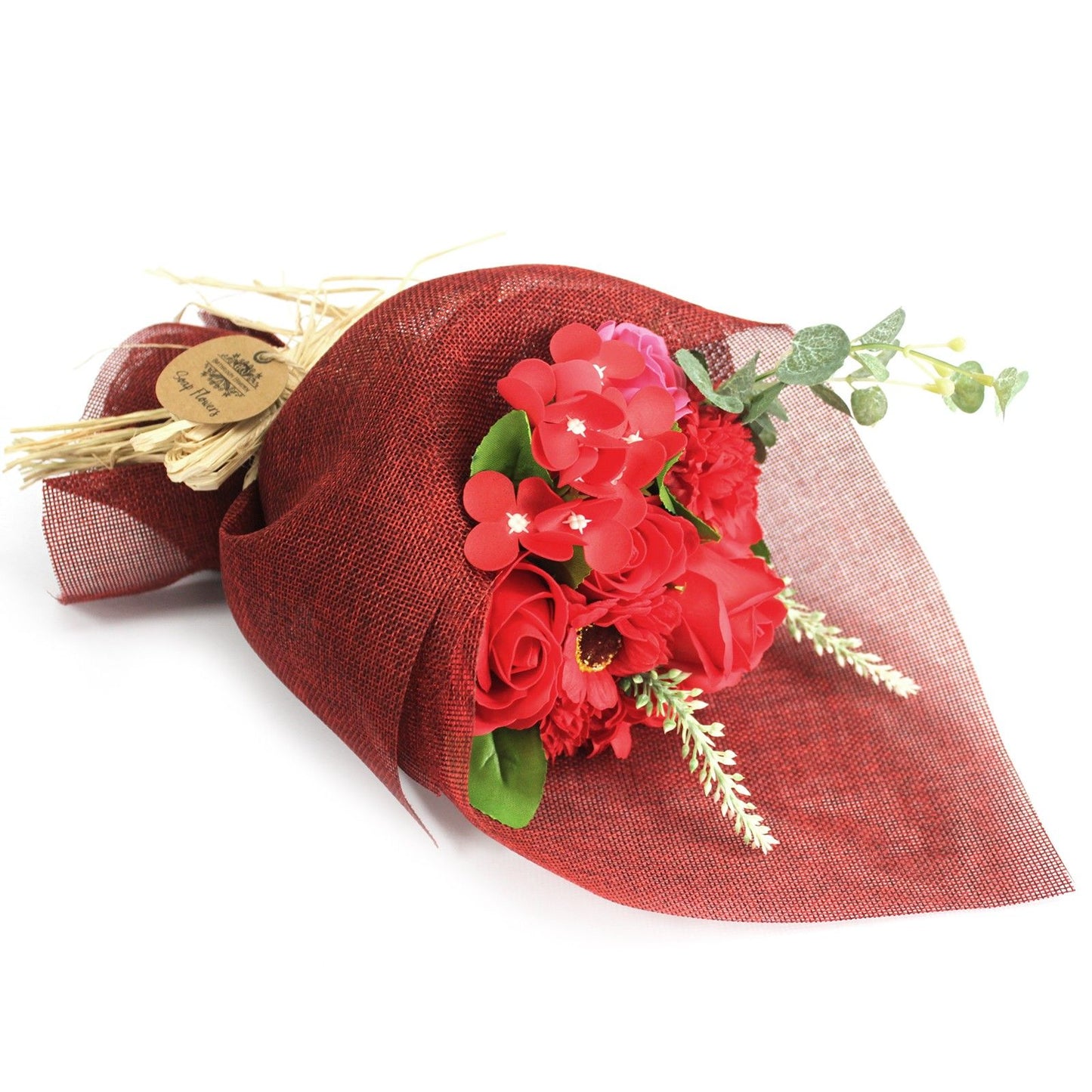 Beautiful red soap flower bouquet arranged in a standing decorative wrap with a red ribbon bow.