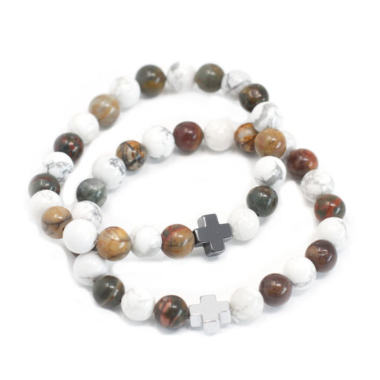 Two stretch gemstone bracelets featuring earthy Picasso Jasper and marbled White Howlite beads with silver-tone accents.
