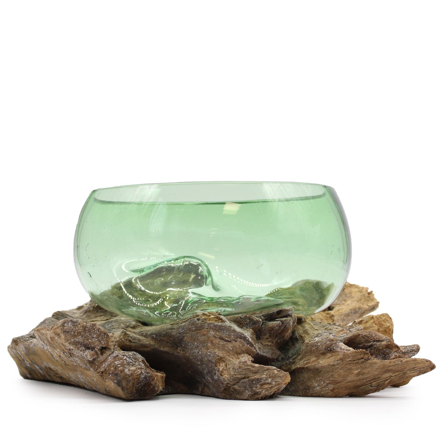 A large, wide molten glass bowl crafted from recycled beer bottles draped over a natural reclaimed wood base.