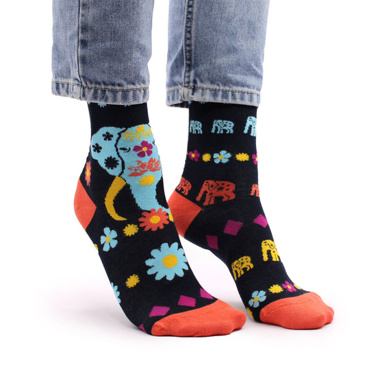 Soft bamboo socks featuring a vibrant cosmic elephant design in size small to medium.