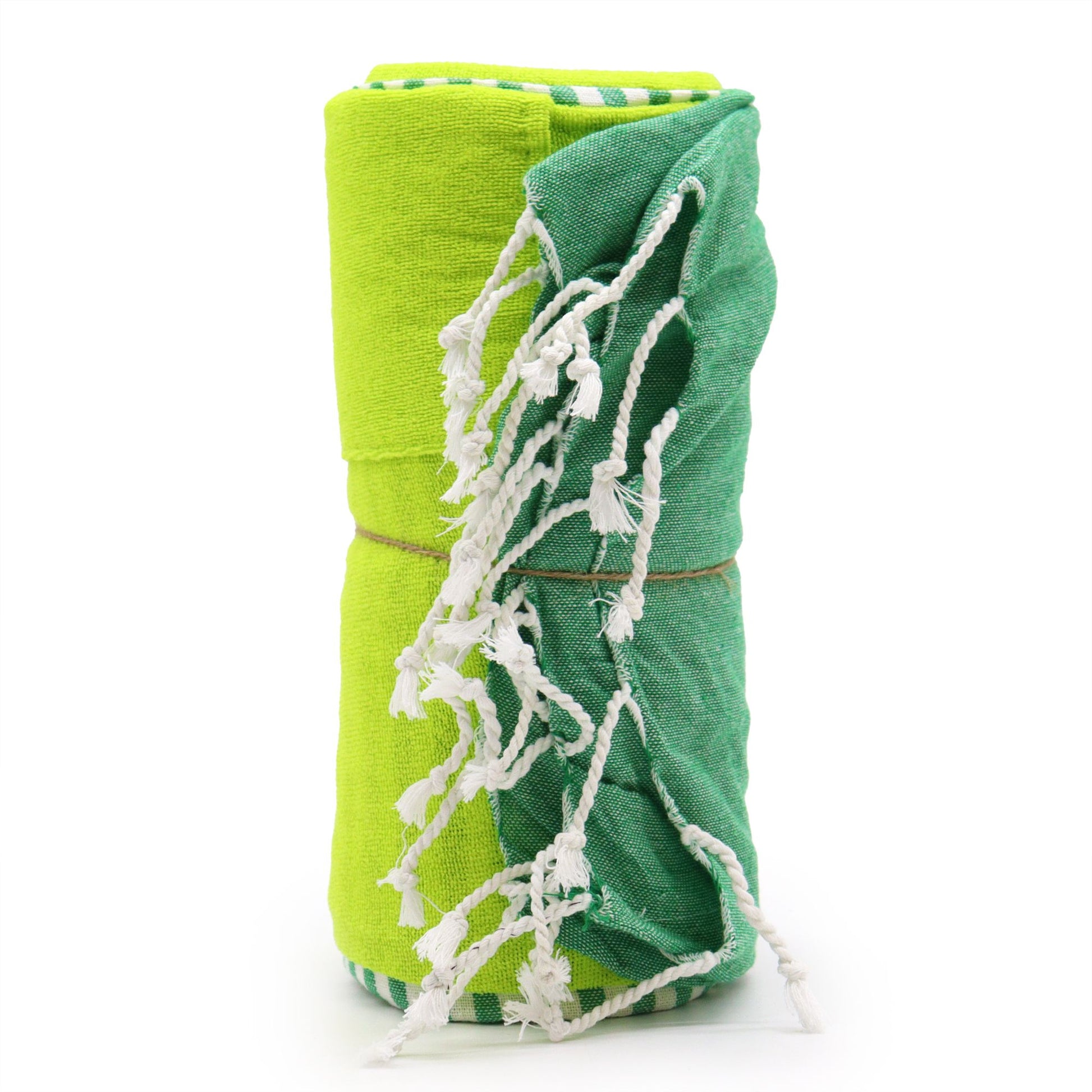 Large green and white patterned cotton pareo towel with a soft handcrafted texture and elegant draped finish.