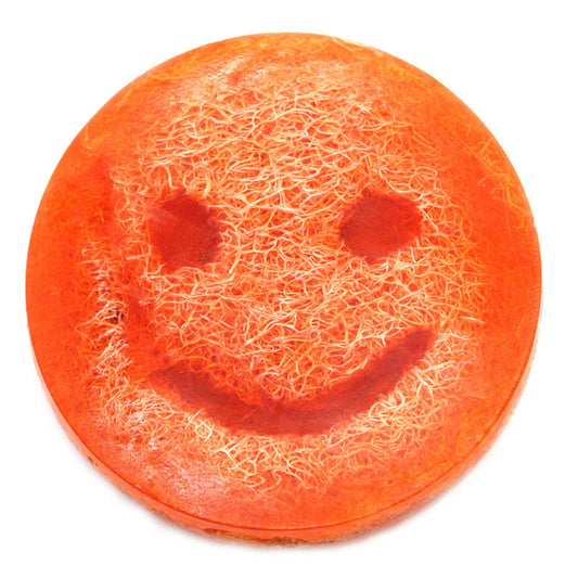 A zesty grapefruit scented exfoliating scrub soap bar with a textured surface for skin renewal.