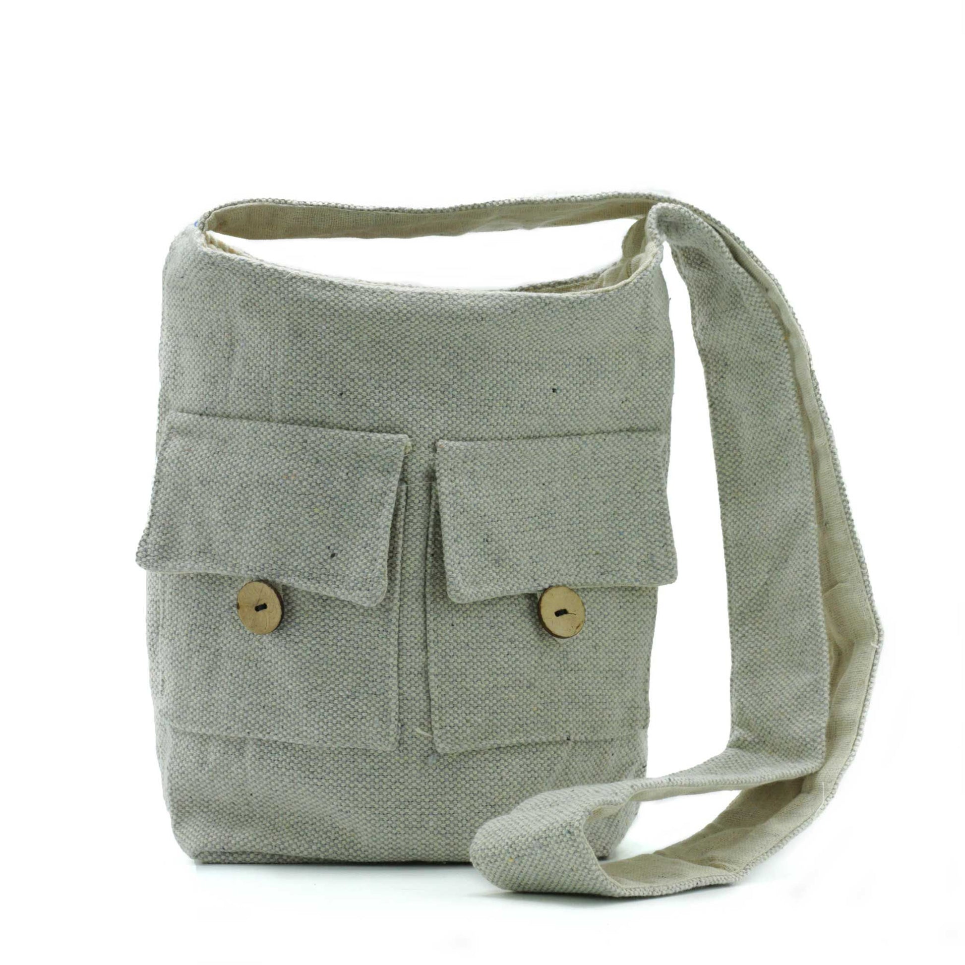 Medium stone coloured cotton handbag with a sleek two pocket design in a neutral tone.
