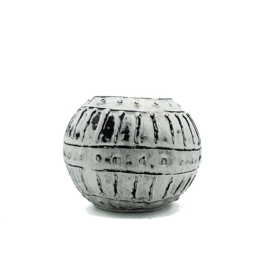 Handcrafted cream-coloured clay plant pot with a unique bubble texture and Greek-inspired aesthetic.