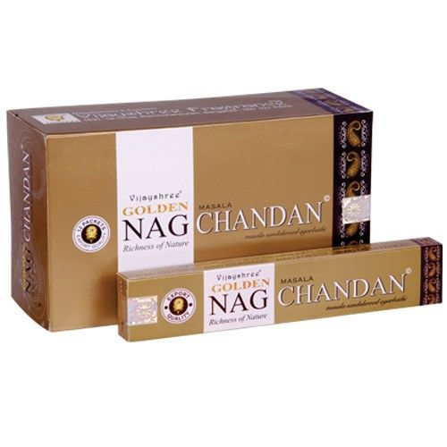 Hand-rolled sandalwood incense sticks with golden branding on the packaging.