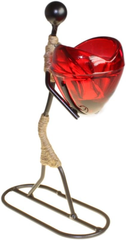 Charming figurine of a girl holding a heart, designed as a decorative romantic tea light candle holder.